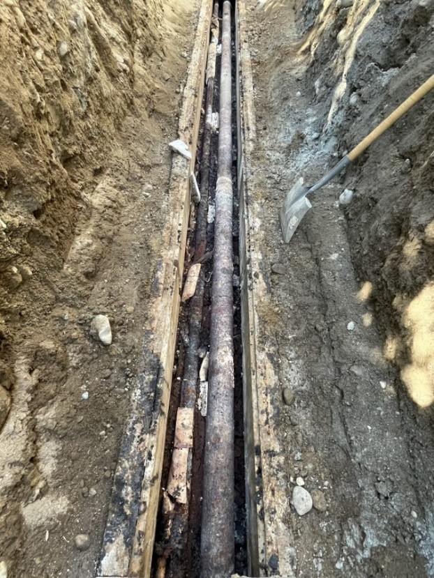 Old, corroded steam line pipe 