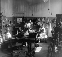 Workers inside the shoe shop at Essondale